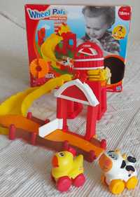 Zestaw Playskool na kółkach przez farmę 18m-cy