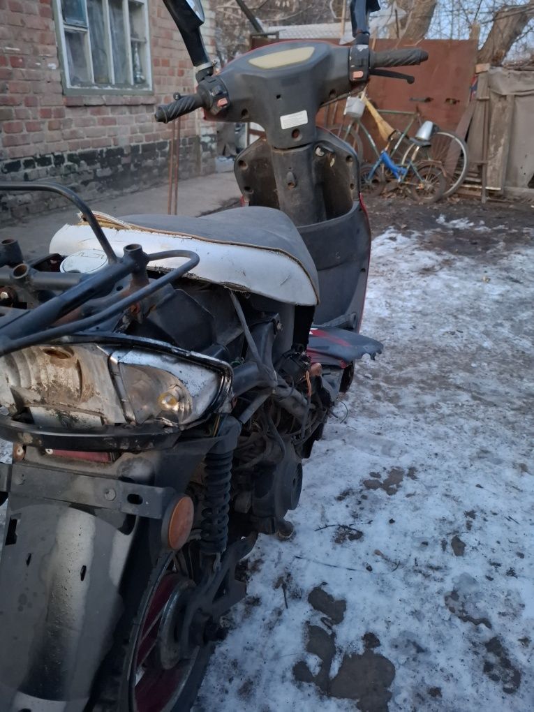 Скутер з талоном
