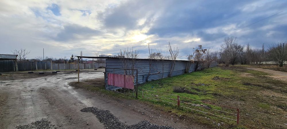 Продаж автостоянки/території. 0.25 га. Октябрьске.