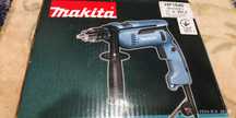 Ударная дрель Makita HP1640