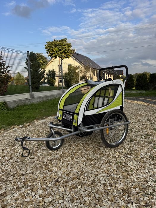 Przyczepka rowerowa dla dzieci AL03 amortyzowana zielona
