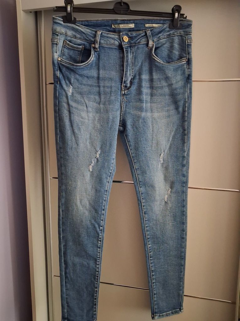 Nowe bez metki jeansy damskie rozmiar 44/XL/XXL