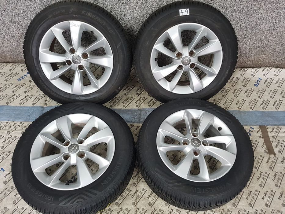 KOŁA CAŁOROCZNE OPEL CORSA D E  ADAM 4X100 185/65R15 6JX15 CZUJNIKI
