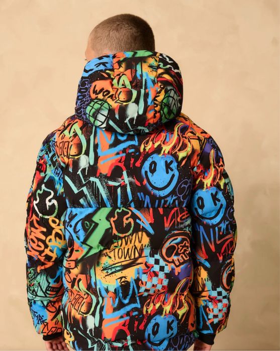 Яскрава зимова куртка Next в наявності