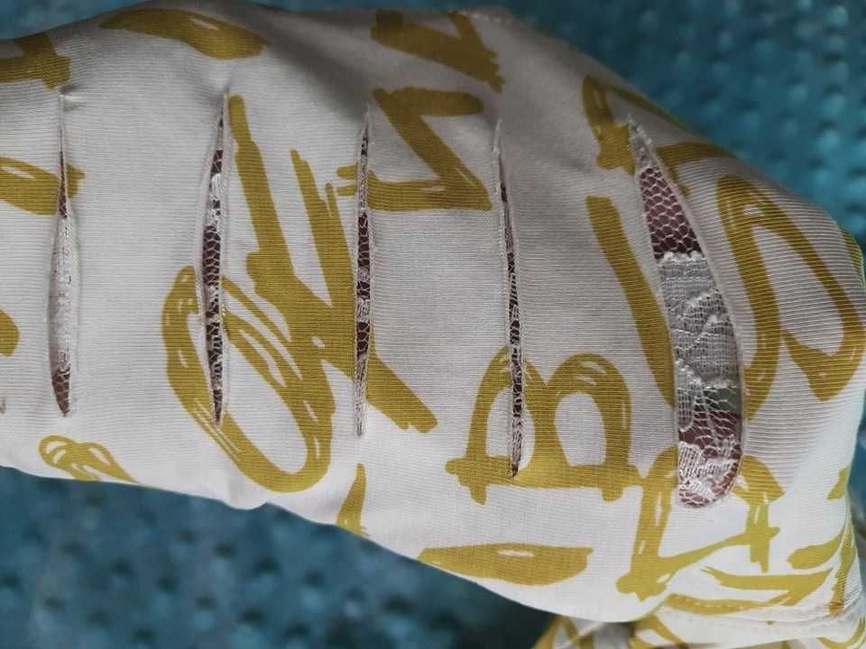 Bawełniane legginsy z literami złote 9 miesięcy