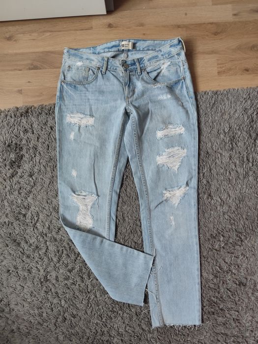 Jeansy damskie z rozdarciami Gina Tricot r. 28/34