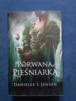 Porwana pieśniarka. Trylogia Klątwy. Tom 1
Jensen Danielle L.