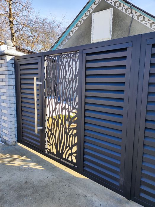 ... SaneX - Group ... Фабрика воріт та металоконструкцій