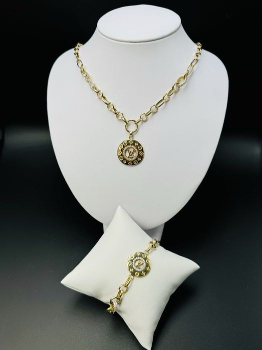 Nowy zloty komplet proba 585 waga 21,47g