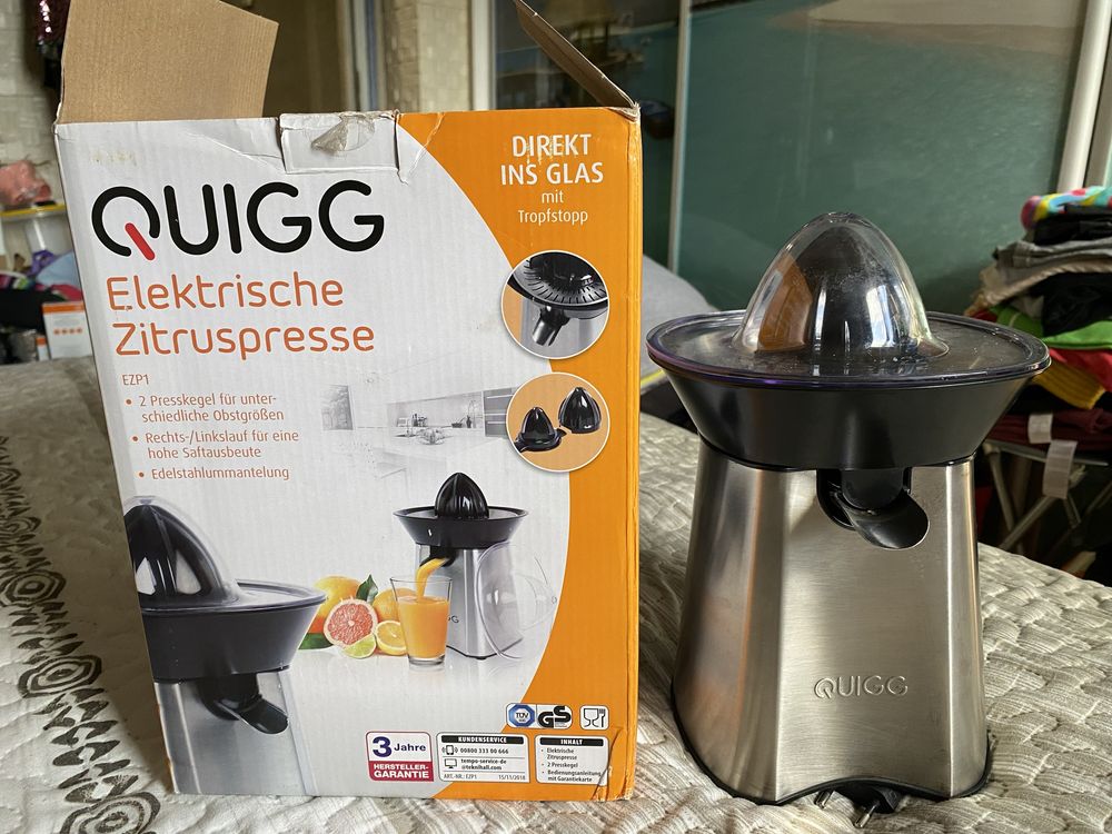 Elektryczna wyciskarka do cytrusow  Quigg