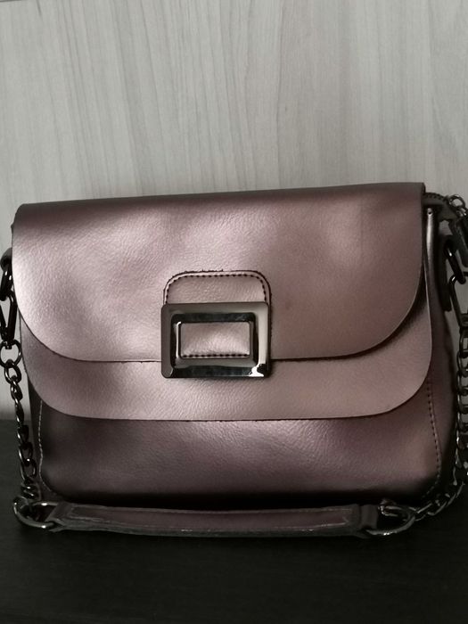 Шкіряна пудрова сумка-клатч