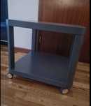 Mesa de centro com rodas cor cinza