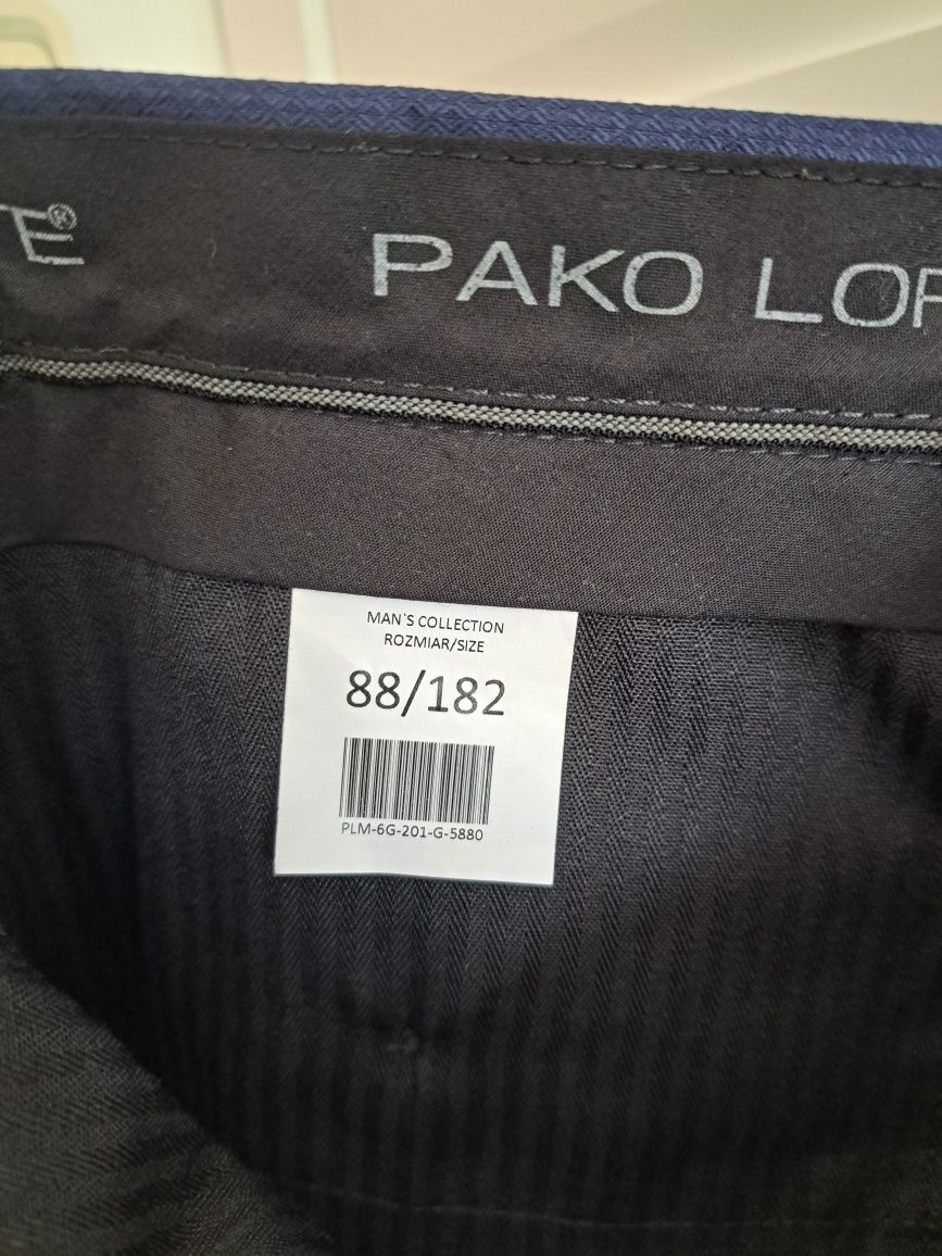 Granatowy garnitur męski z marynarką w kratkę.  Pako Lorente. M/L
