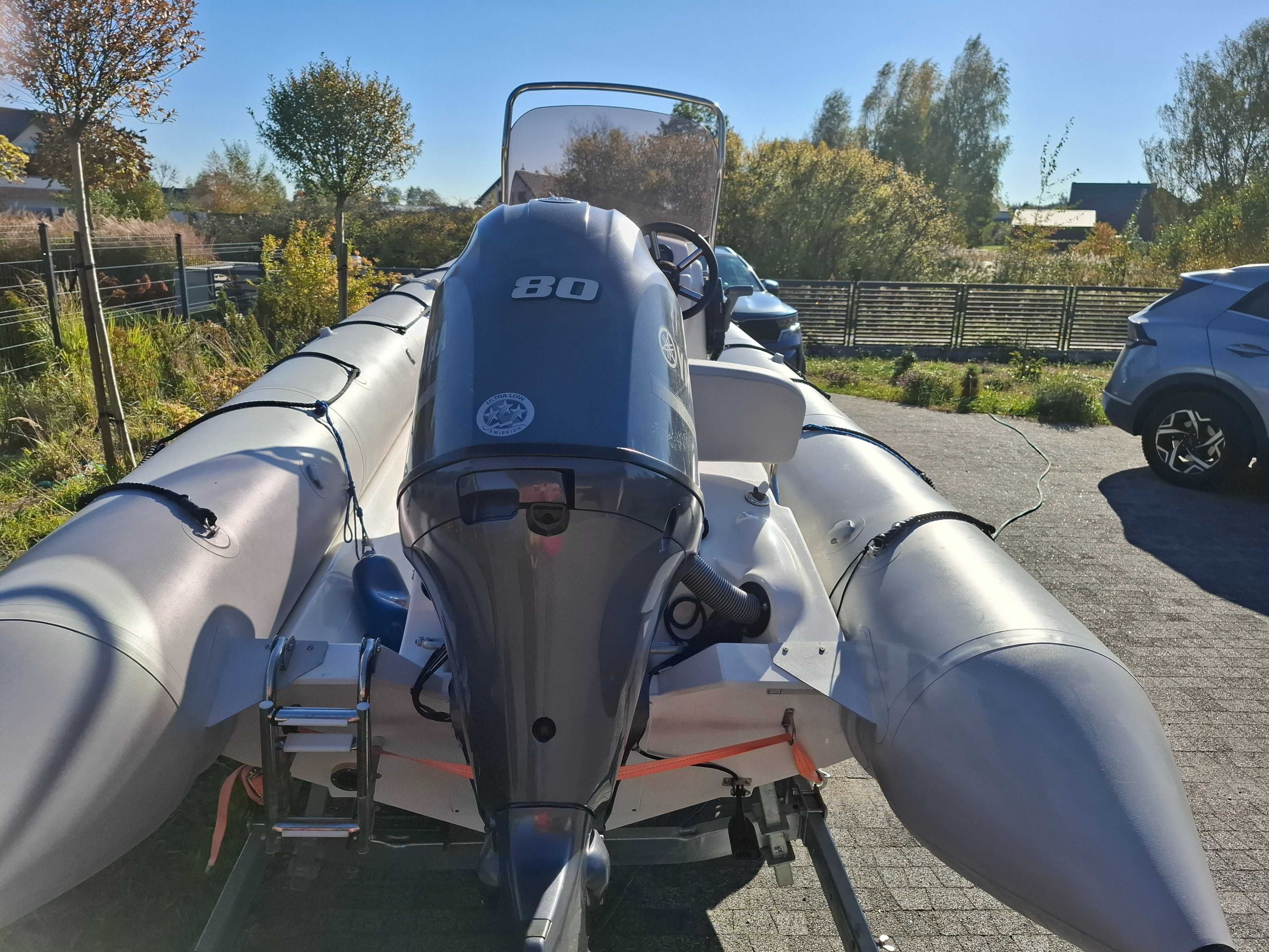 Sprzedam łódz motorową RIB sunrider 550 wraz z przyczepą .