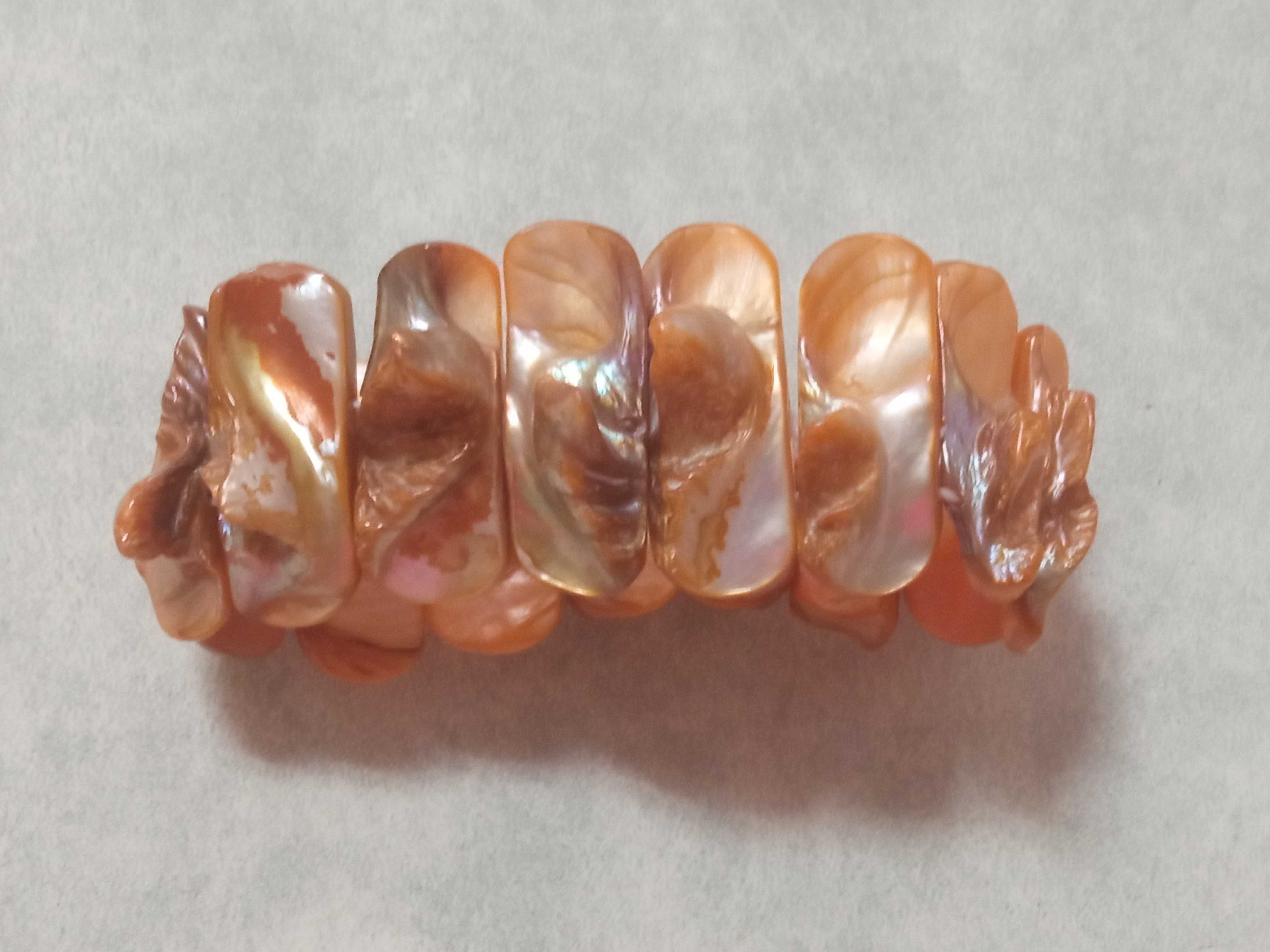 Nowa bransoletka z masy perłowej pomarańczowa na gumce 18 cm