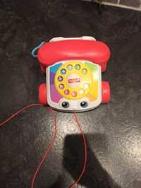 Telefon dla gadułki, zabawka interaktywna marki Fisher Price