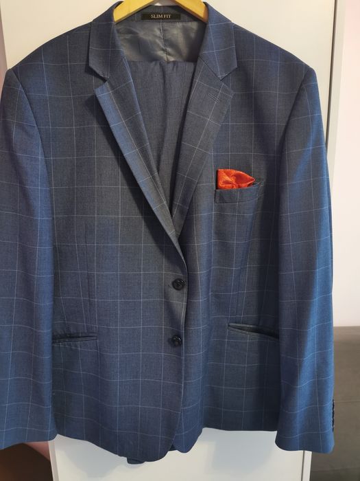 Garnitur Męski vestitoVesta rozmiar 60/176  jasny niebieski w kratę.