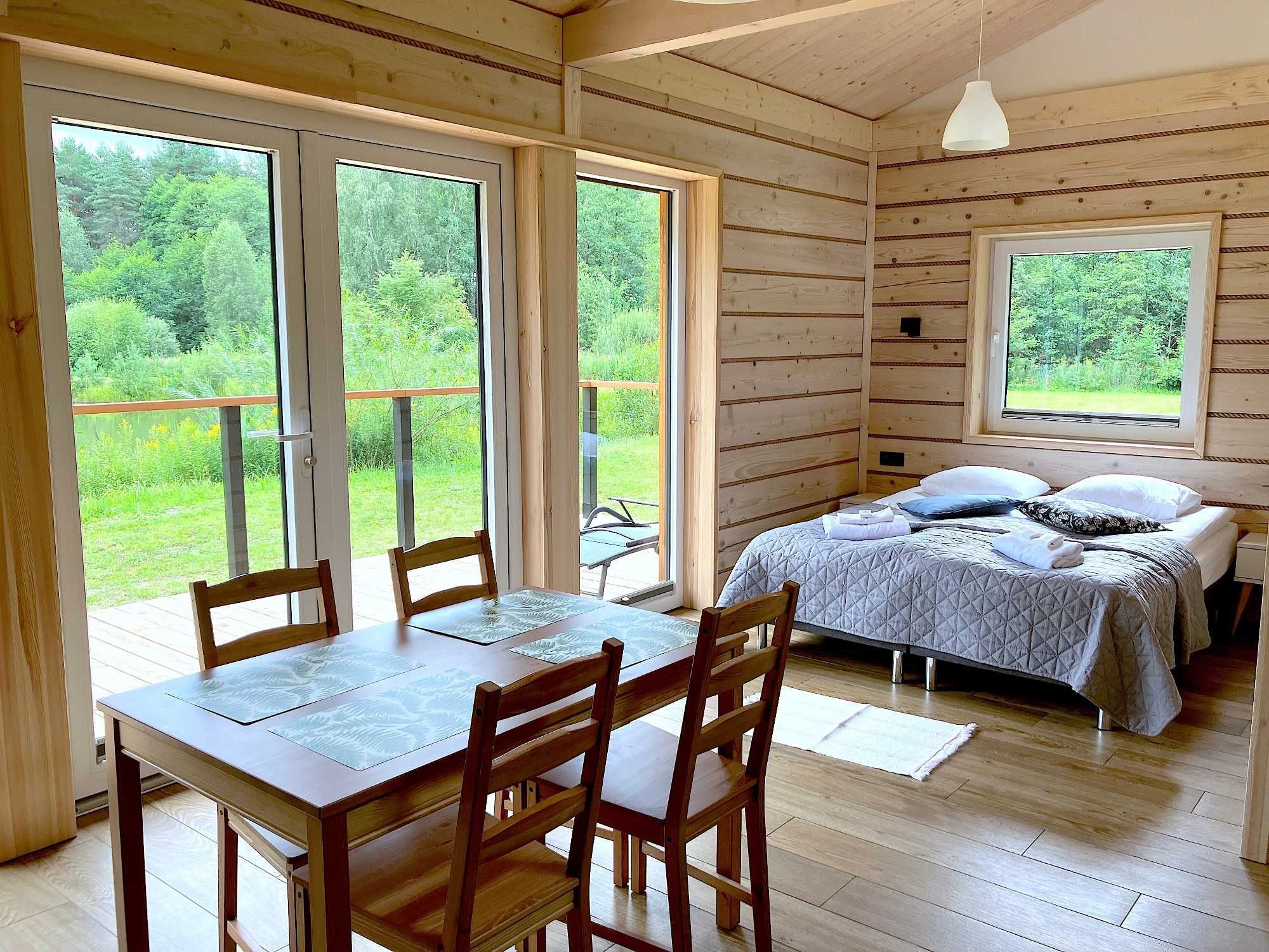 2 os Domek nad Stawem z balią jacuzzi jeden na terenie na odludziu las