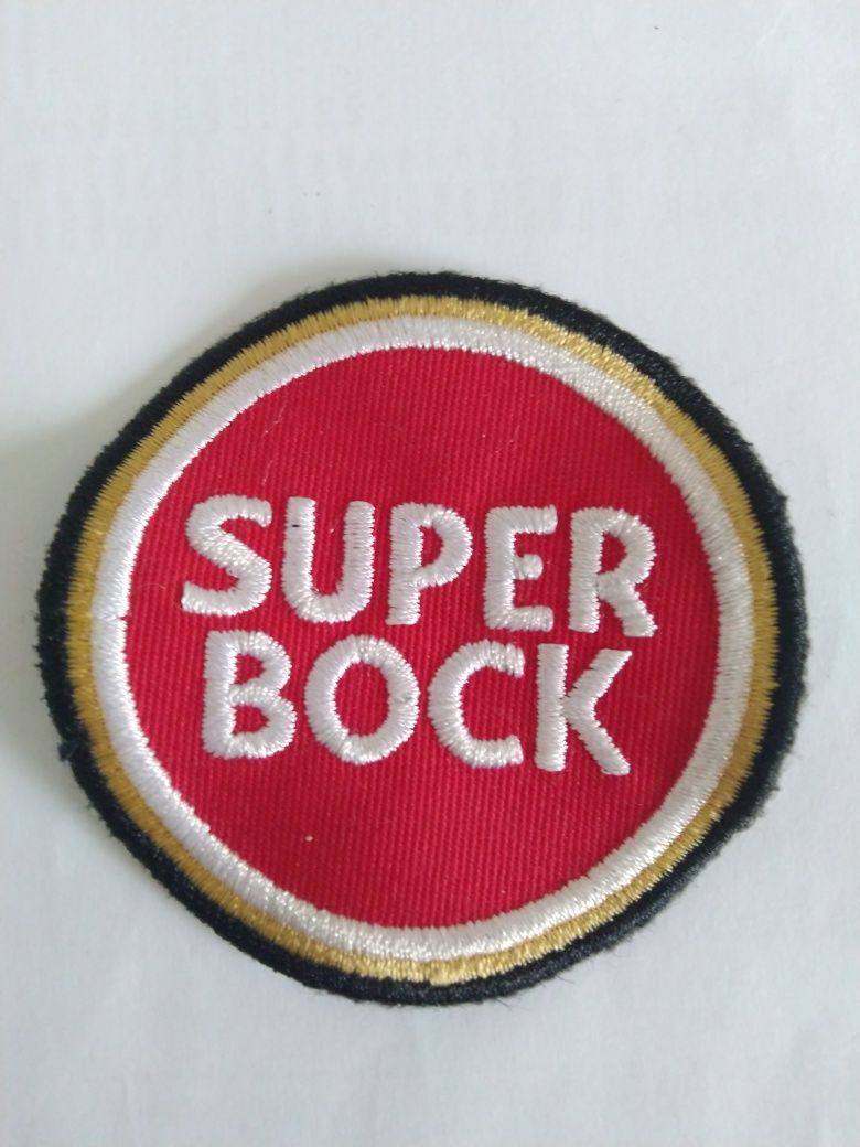 Isqueiros Super Bock e Coca e embelema da Super Bock