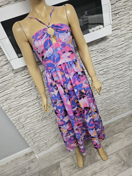 Przepiękna letnia sukienka w kwiaty z ozdobnym dekoltem rozmiar L