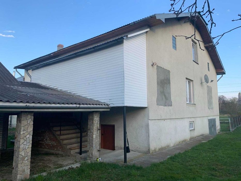 Продається будинок та земельна ділянка. Ідеальне розташування.