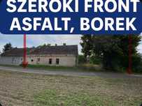 Działka 608 m² z domem do rozbiórki – szeroki front, asfalt, Borek