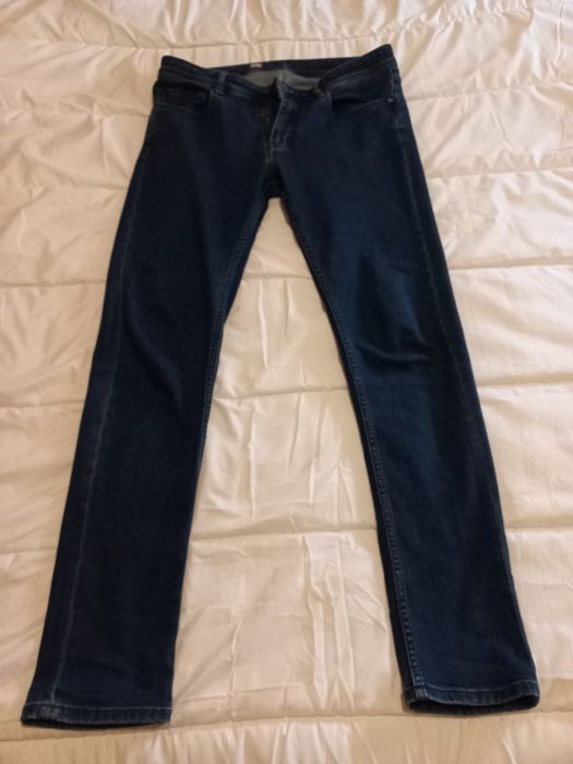 Calças de ganga como novas da Decenio