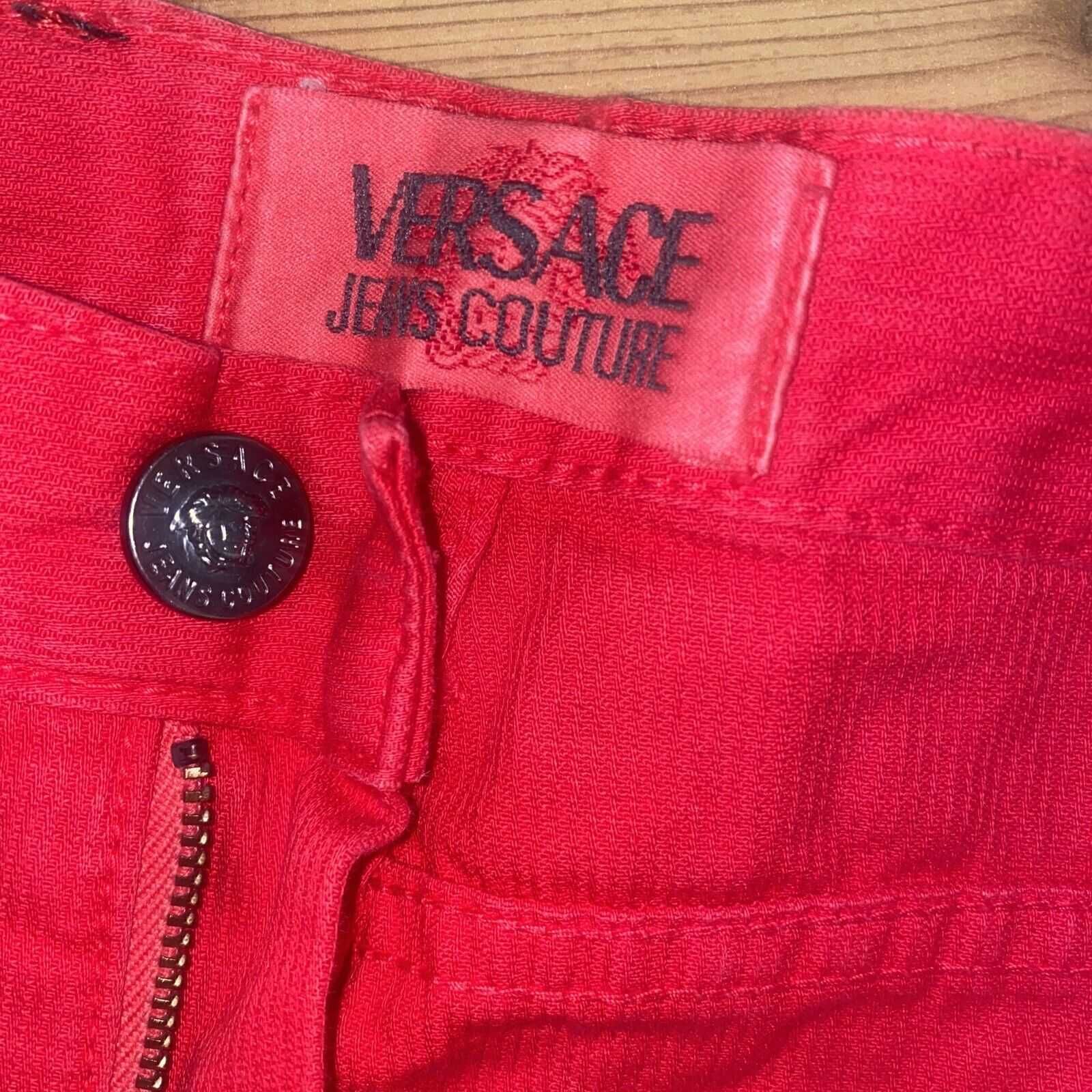 Джинси  Versace червоні