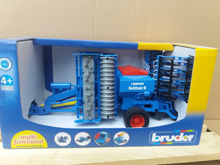 Іграшки брудер. Сівалка Брудер. Bruder іграшки. оприскувач Bruder