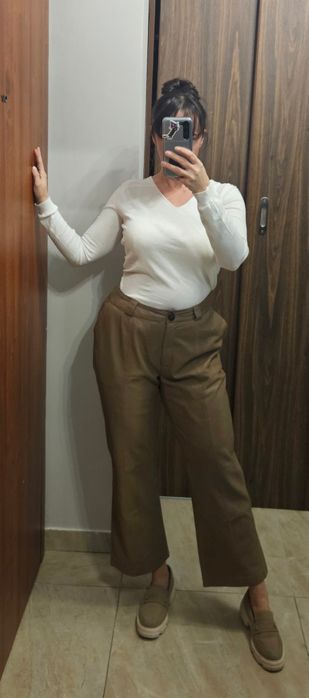 Beżowe spodnie Ochnik skórzane skóra