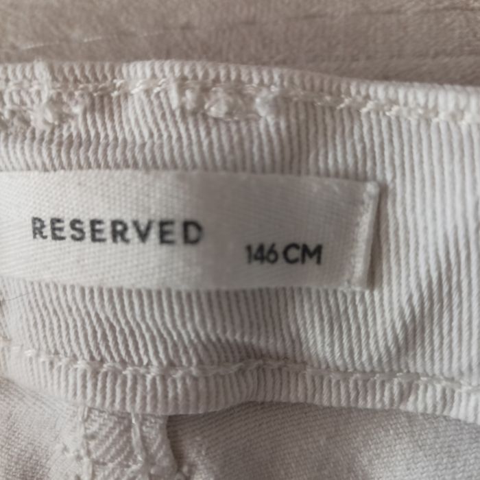 Штани джинси білі кльош на дівчину