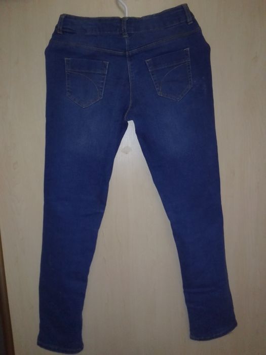 Джинсы утеплённые 140р. на девочку 9-11лет