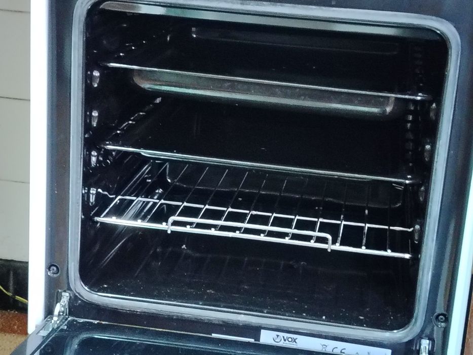 Fogão elétrico com quatro discos e forno