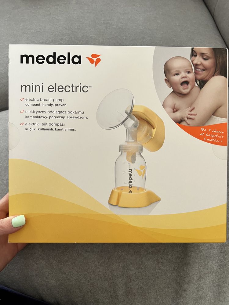 Laktator Medela mini electric+butelka Medela ze smoczkiem Calma+Gratis