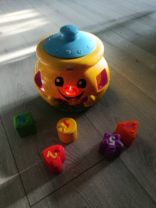 Garnuszek na klocuszek Fischer Price po polsku