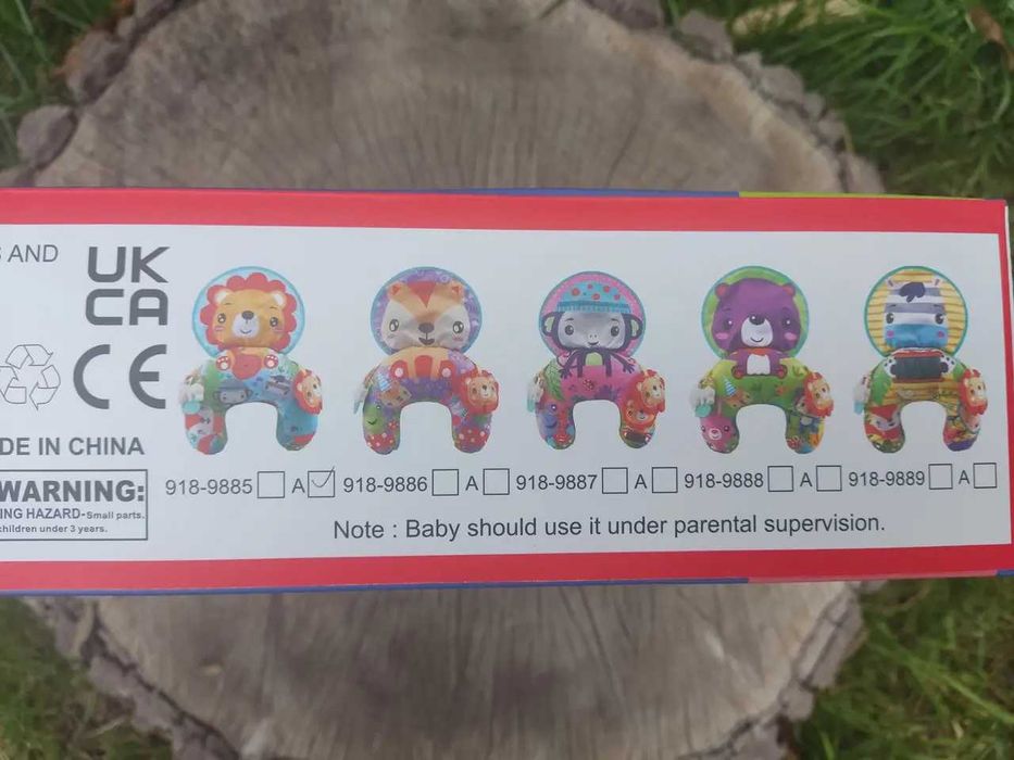 Розвиваючий музичний килимок-подушка з брязкальцем і прорізувачем 918