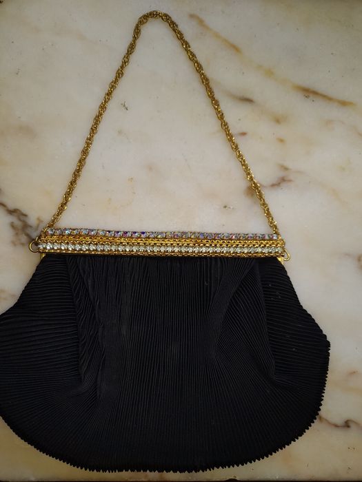 Luvas e pochetes vintage