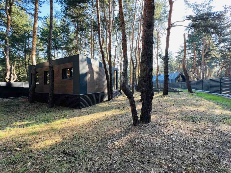 Продам участок в Обуховке в сосновом лесу с недостроем