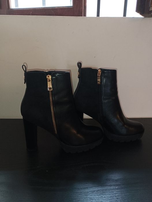 Bota de salto cano medio