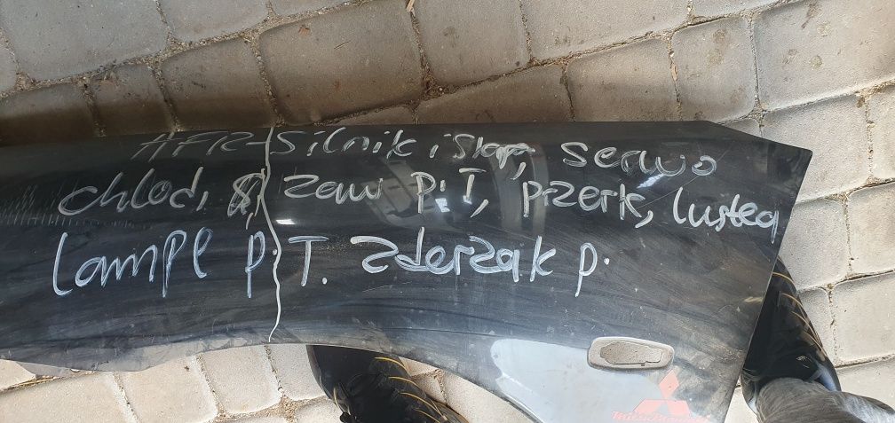Tłumnik do mitsubishi carisma i błotnik