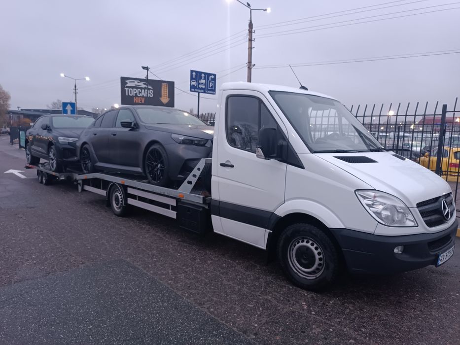 Услуги эвакуатора. Харьков Львов.