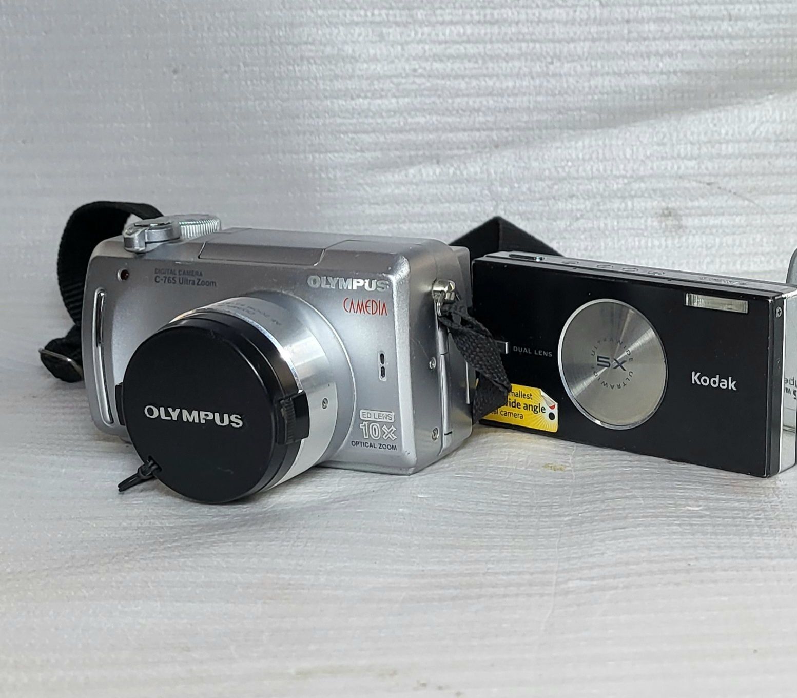 Цифровые фотоаппараты Olympus, Kodak с нюансами