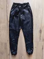 Skórzane legginsy spodnie z gumka i ściągaczami missguided 38