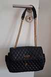 Mala Guess como nova