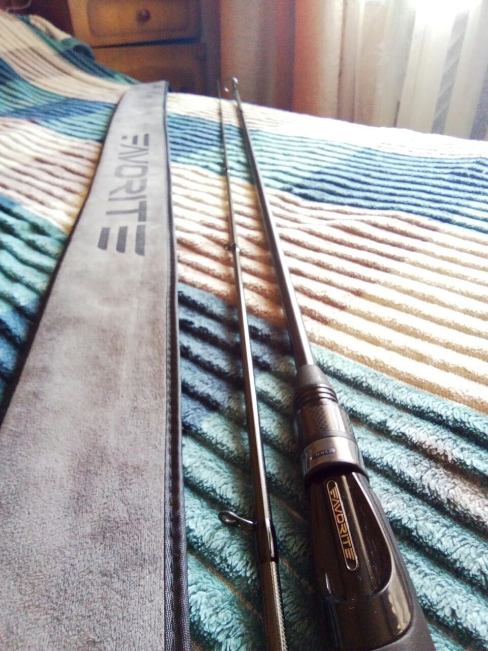 Спининг Favorite Black Swan BSW1-7112L-T 2.41m. 2-10g Fast