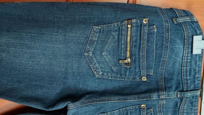 Spodnie jeansy John Baner rozm. 38.