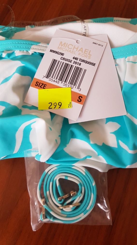 Michael Kors Turquoise góra od bikini z falbanką
Przypinane ramiączka