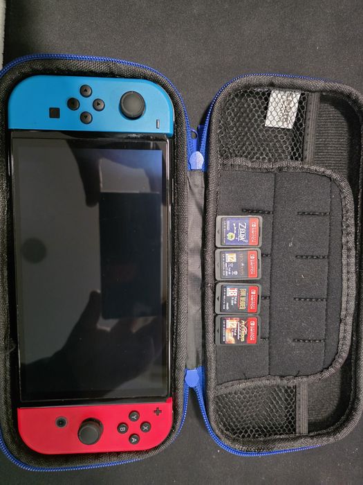 Nintendo switch oled komplet z pudełkiem + 4 gry.