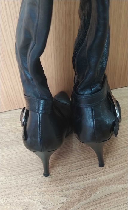 Botas cano alto em pele