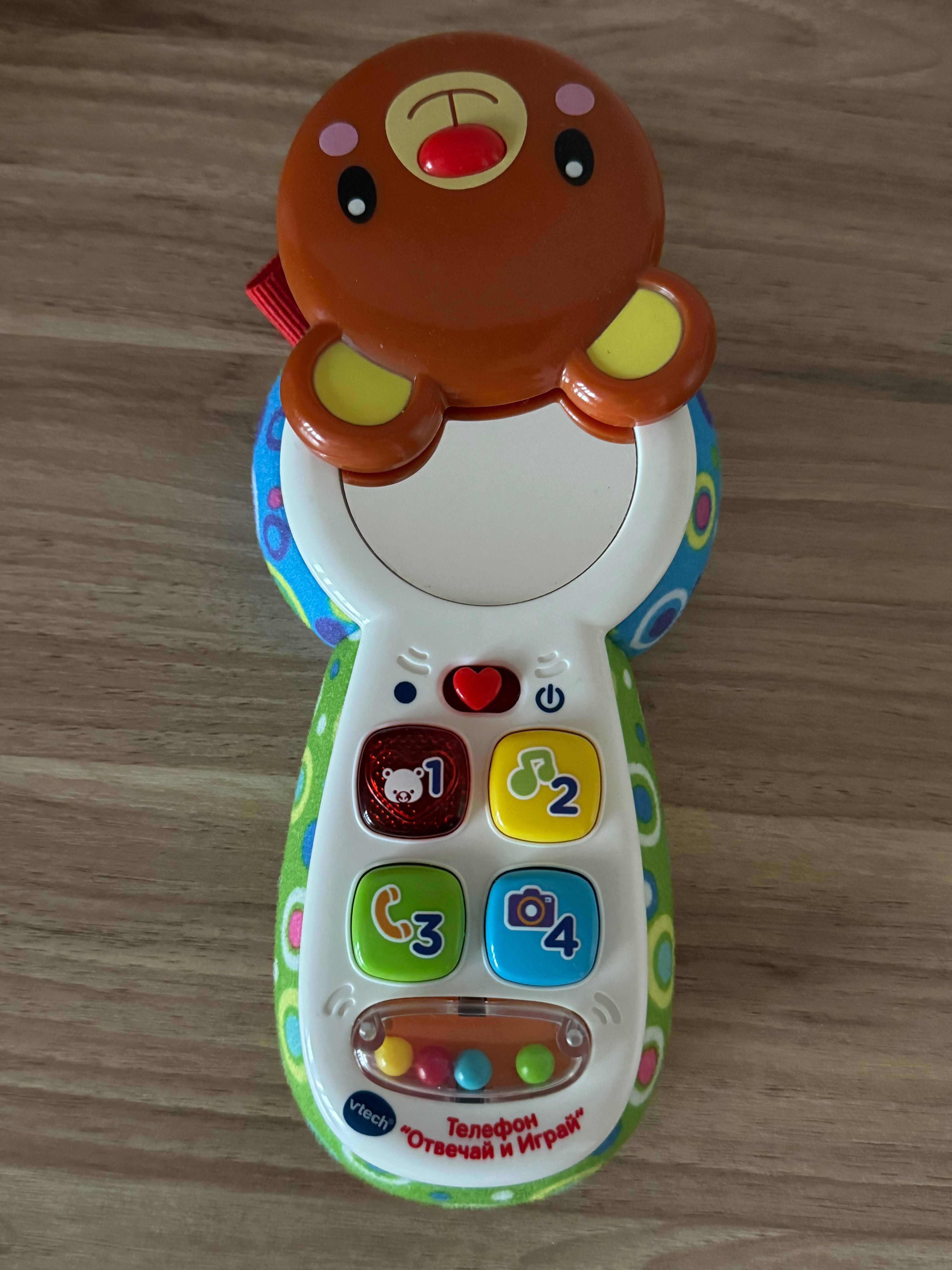 Развивающая игрушка-телефон VTech "Отвечай и играй" с рус. озвучкой